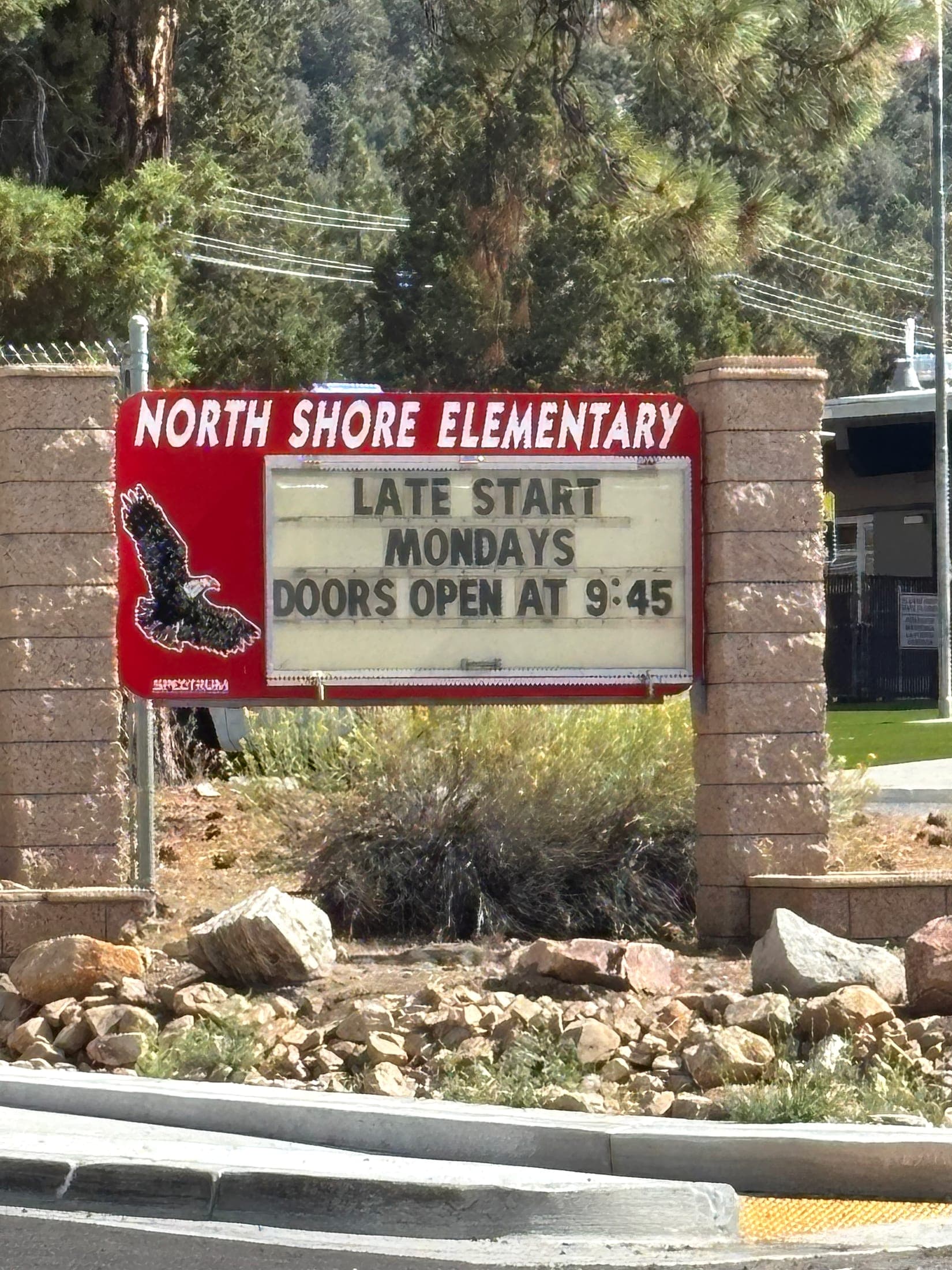 North Shore Elementary monument sign among pines in Big Bear City