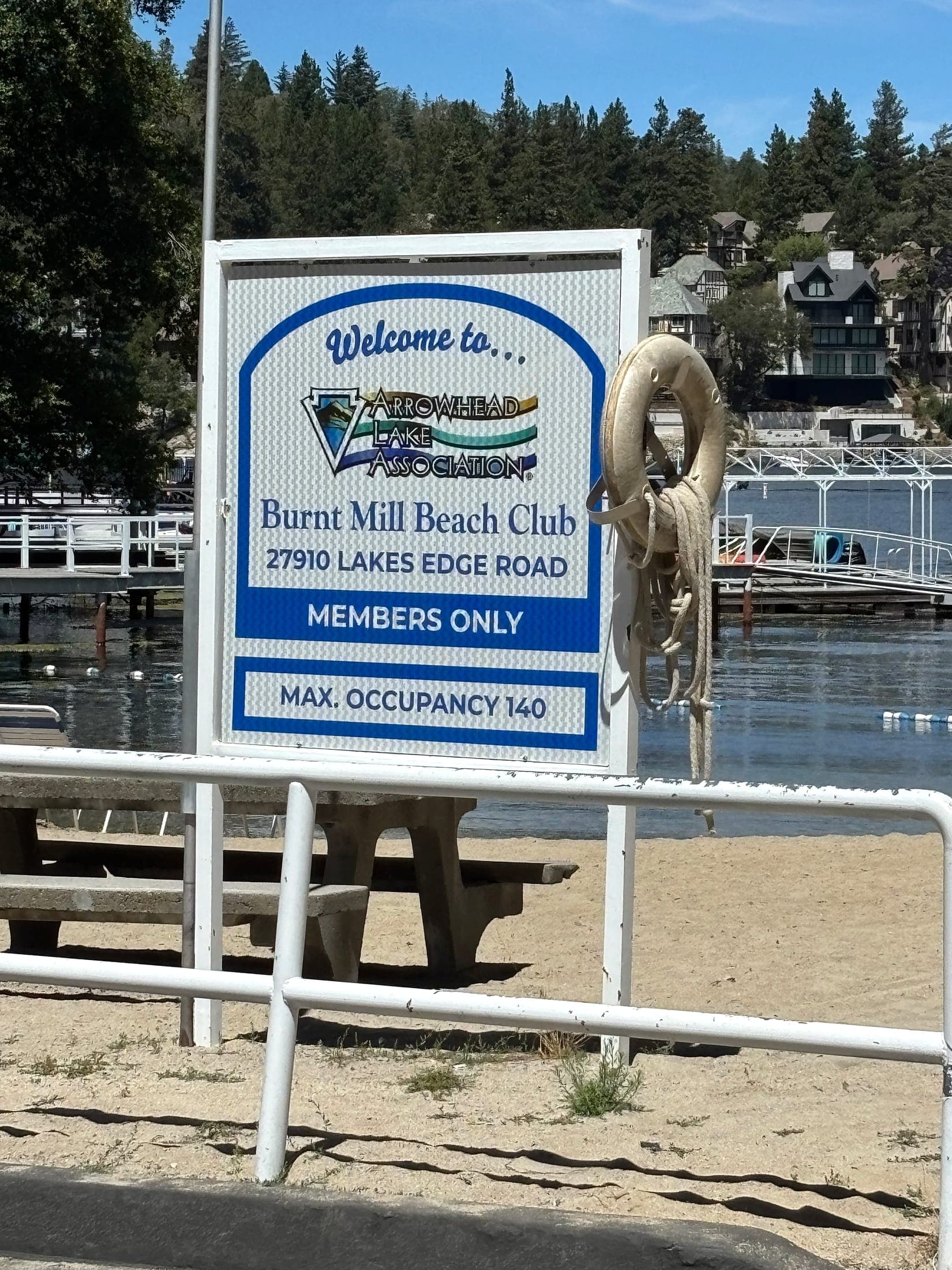 Welcome sign for Burnt Mill Beach Club, members only, at Lake Arrowhead, California