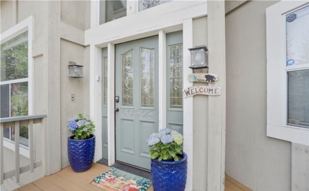 Green front door and deck entry at 163 S Grass Valley, Lake Arrowhead