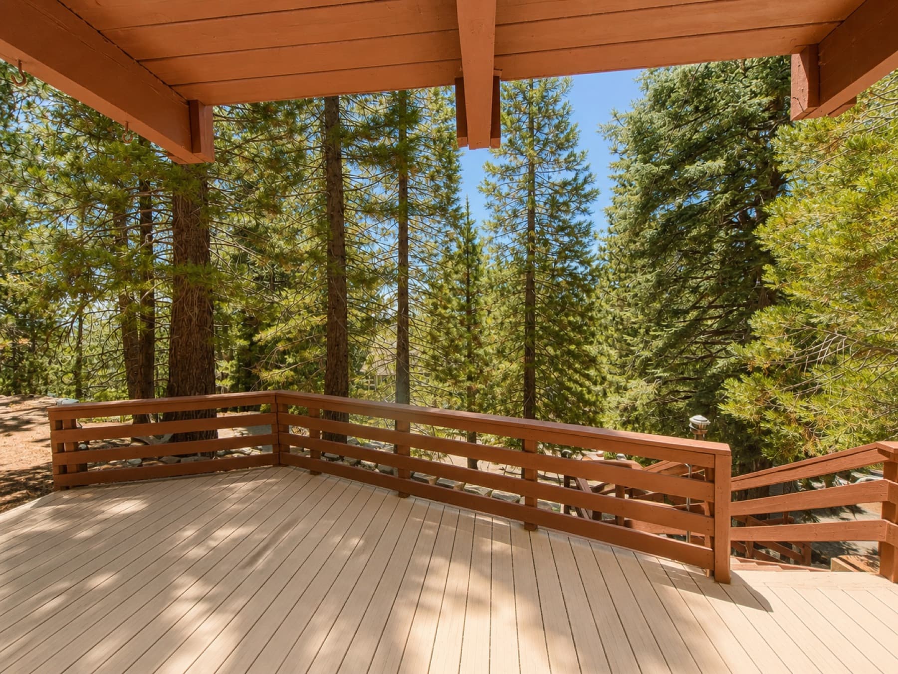 Wood deck among pine trees at a Running Springs mountain home